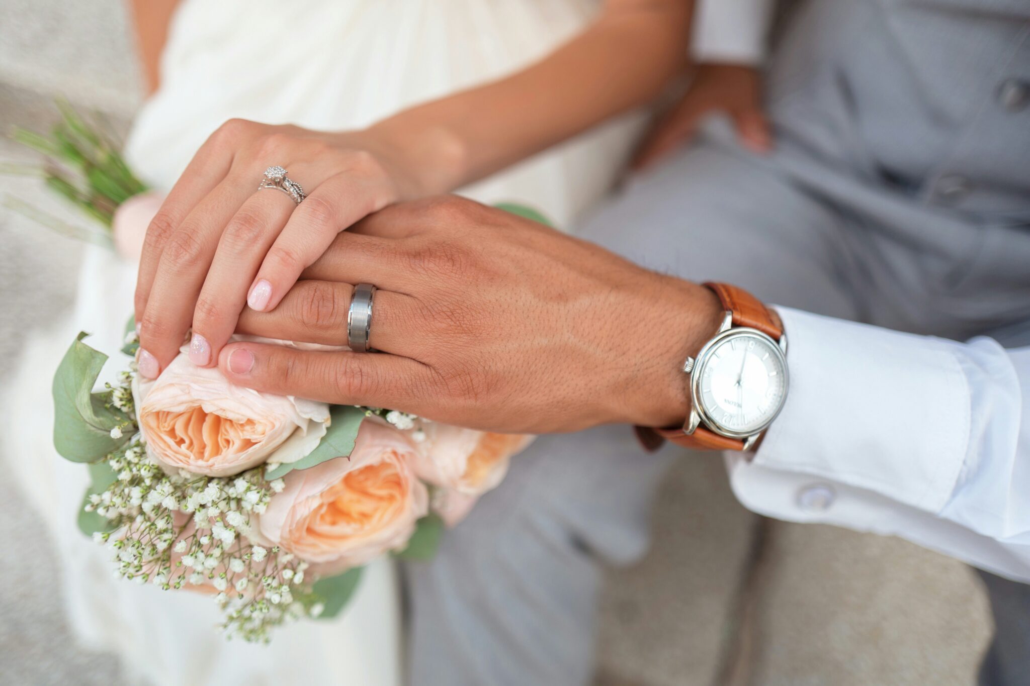 a couple holding hands symbolizing marriage tax credits