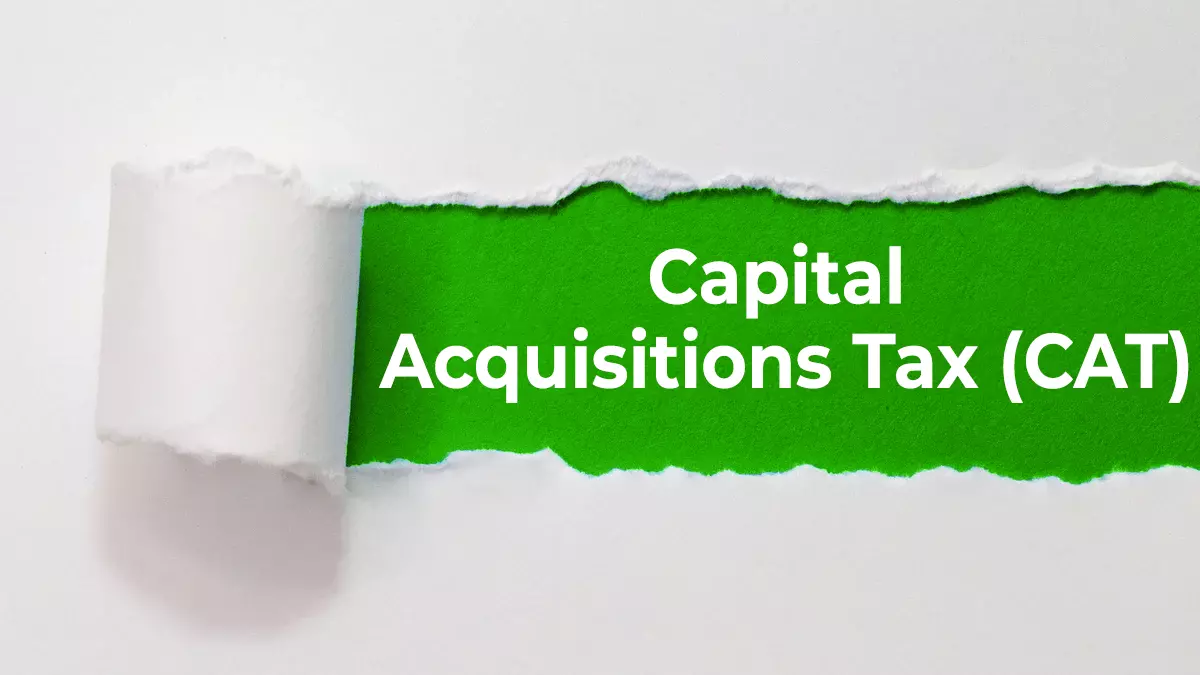 A piece of paper that has been torn in the centre and displays the text capital acquisitions tax (CAT)