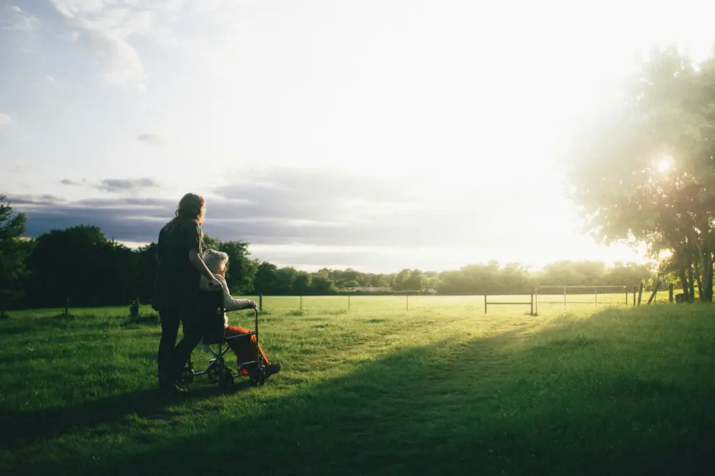 a woman who receives the dependent relative tax credit pushing an elderly relative